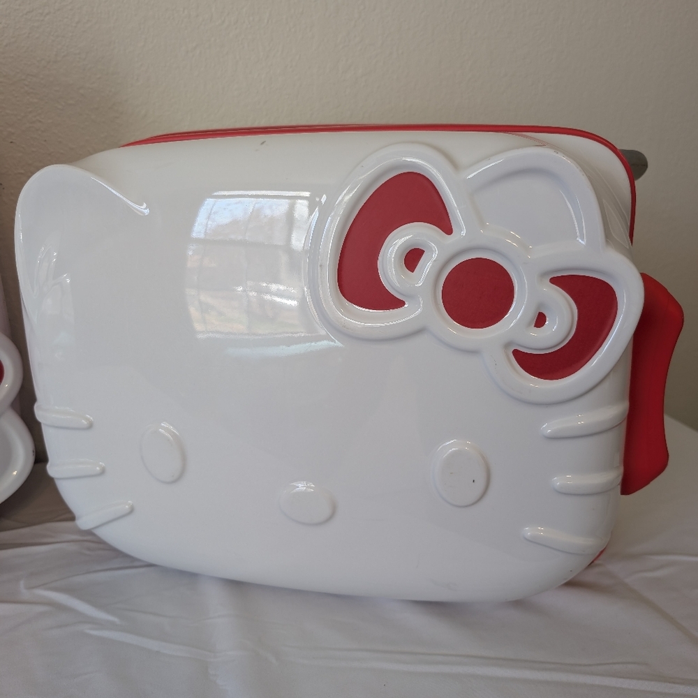 Cute hello kitty white and red carry on luggage $120 each or $200 for both